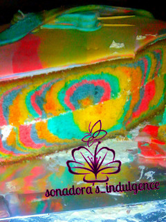 A picture of #bakecake multicolored marble birthday cake.