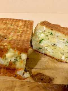 Una foto de Pastel salado con calabacín y calabaza