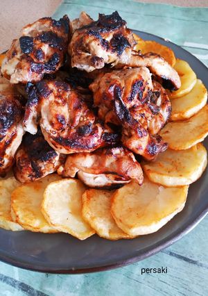 A picture of Grilled Chicken Ribs on the Charcoal Grill 🍗.
