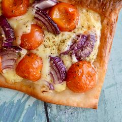 A picture of Tomato, Cheese and Onion Tarts.