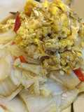 Crab flavored eggs over a cabbage bed 蟹黄蛋盖酸辣白菜