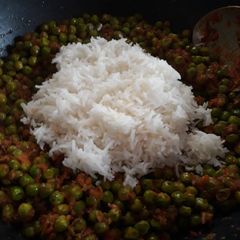 A picture of Spicy Matar With Rice.