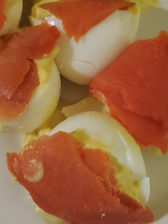 A picture of Deviled eggs and lox.