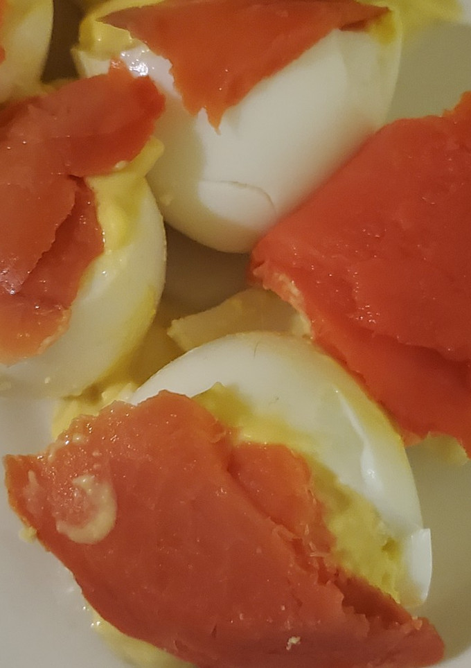A picture of Deviled eggs and lox.