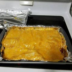A picture of Chicken Enchiladas.