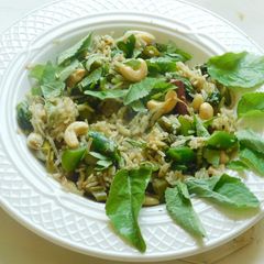 A picture of Aromatic, spicy, and healthy pilaf with basil Pesto and vegetables.