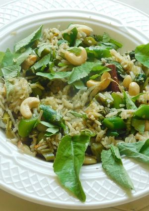 A picture of Aromatic, spicy, and healthy pilaf with basil Pesto and vegetables.