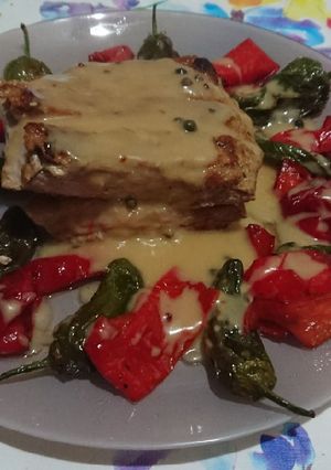 Una foto de Secreto ibérico con pimientos