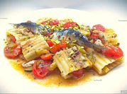 Una foto di paccheri con pesce fresco