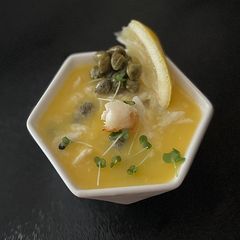 A picture of Cornish Potted Crab with lemon & Capers.
