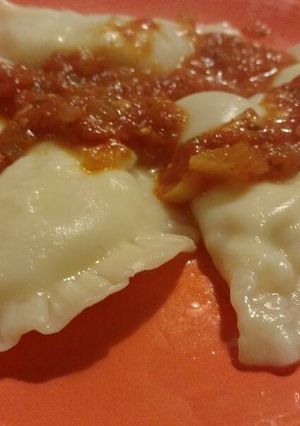 Una foto de Sorrentinos de mozzarela y tomate cherry