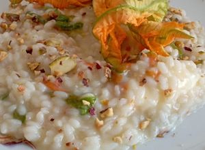 Foto di Risotto con fiori di zucca, Philadelphia e granella di pistacchi