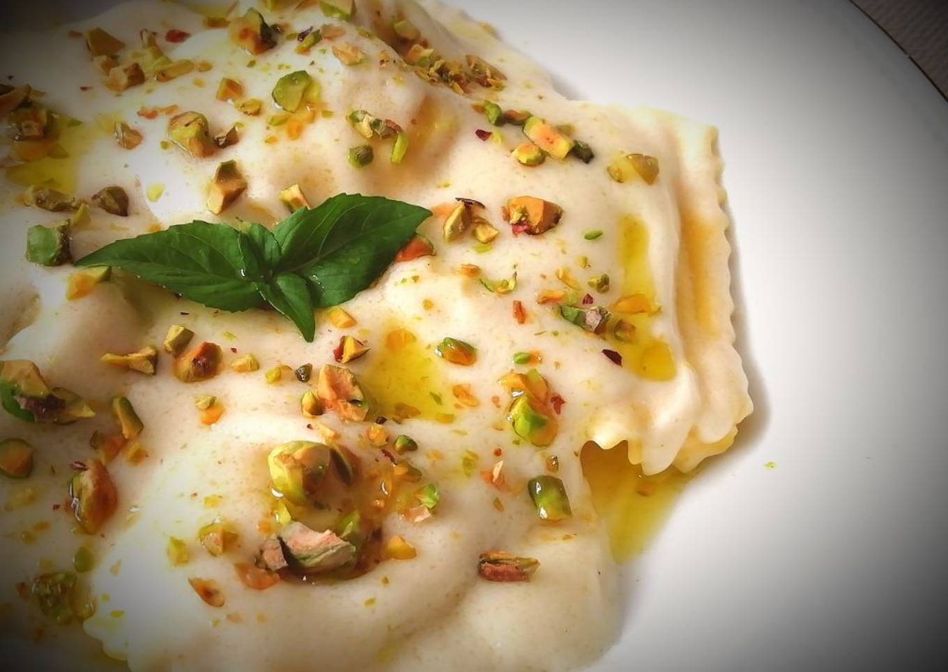 Raviolis de Calabaza  a la crema de Grana Padano