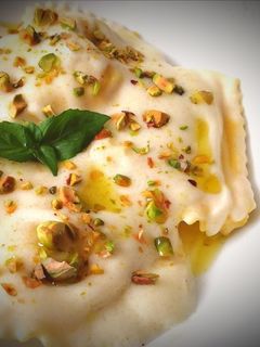 Una foto de Raviolis de Calabaza a la crema de Grana Padano