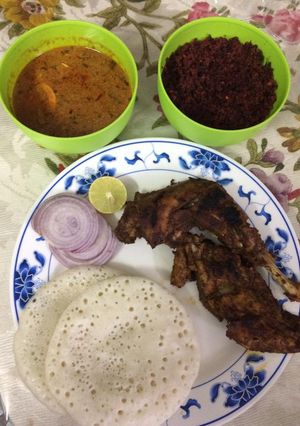 A picture of Kerala appam with egg curry,beetroot toran (with coconut).