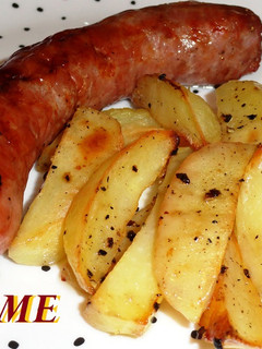 Una foto de Butifarra con patatas al horno