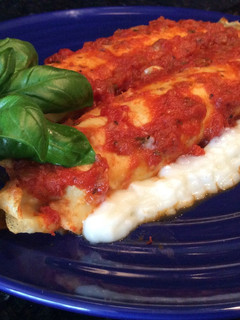 Una foto de Canelones de Tres Quesos y Espinaca