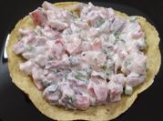 Una foto de pulpo cocido y mayonesa