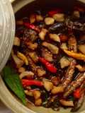 Braised Goby Fish in Clay Pot with Vietnamese Coriander
