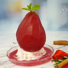 A picture of Spiced poached pear with beet.