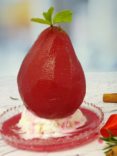 A picture of Spiced poached pear with beet.