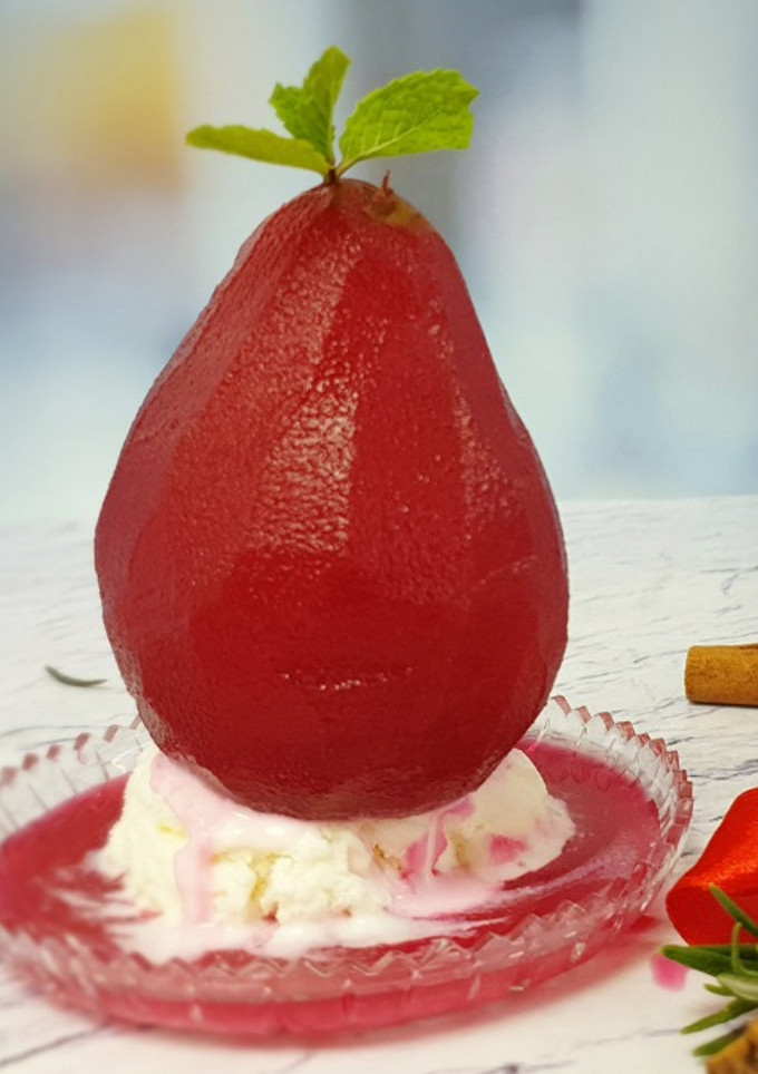 A picture of Spiced poached pear with beet.