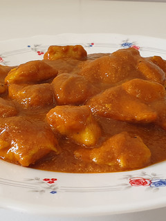 Una foto de Pollo al curry