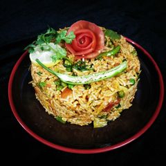 A picture of Tomato Pulao (mumbai street style).