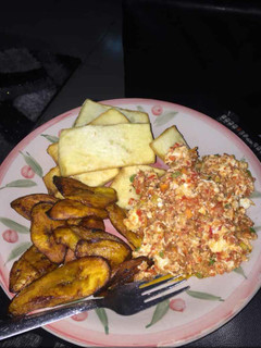 A picture of Fried plantain,yam and egg.