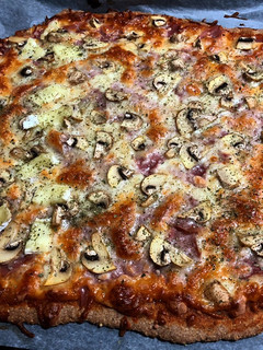 Una foto de Base de pizza integral con sésamo (en Mambo)