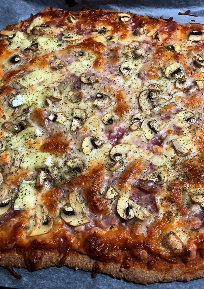 Una foto de Base de pizza integral con sésamo (en Mambo)
