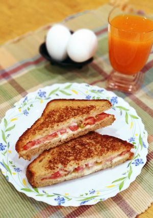 A picture of Cheese tomato Sandwich.