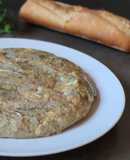 Tortilla de alcachofas y ajos tiernos
