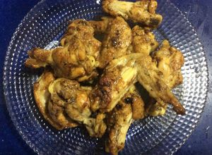 Una foto de Alitas de pollo al brandi
