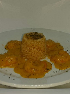 Una foto de Langostinos al curry