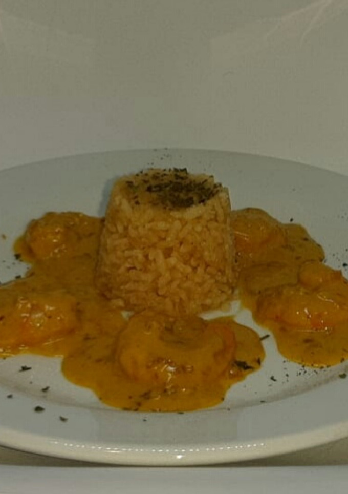 Una foto de Langostinos al curry
