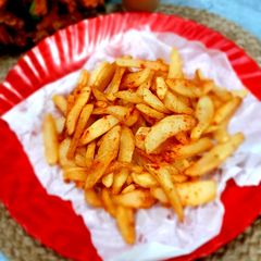 A picture of Potato wedges.