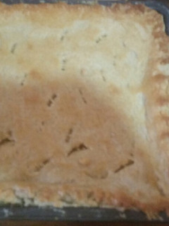 A picture of Pork in a pie.