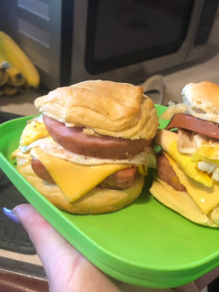 A picture of Smoked sausage n Canadian bacon Breakfast sandwiches.