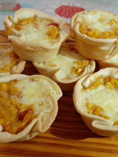 Una foto de Canastitas de humita y queso