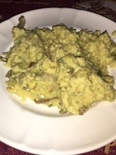 Una foto de Risotto de setas de cardo y espárragos de nuez