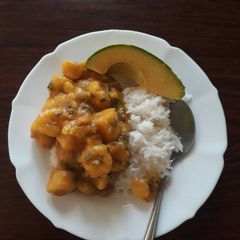 A picture of Cooked bananas with rice.