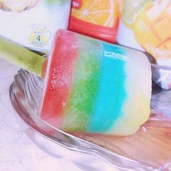 A picture of Rainbow Popsicles.