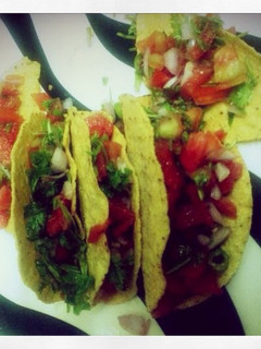 A picture of Tacos with watermelon Salsa.