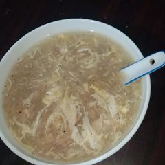 A picture of Chicken corn soup.
