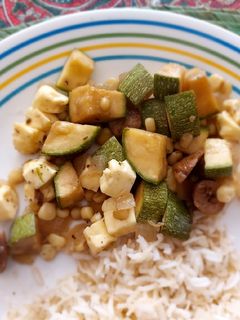 Una foto de Calabacitas con champiñones y elote