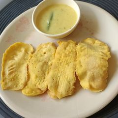 A picture of Fafda With besan chutney.