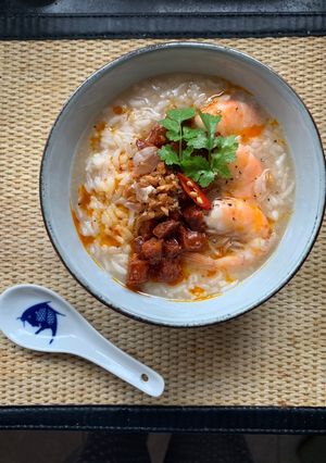 A picture of Thai-Spanish rice congee (Chorizo and prawns rice soup).