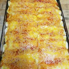A picture of Cheesy Chicken Enchiladas.