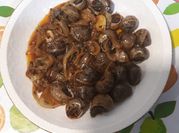 Una foto de salsa para caracoles